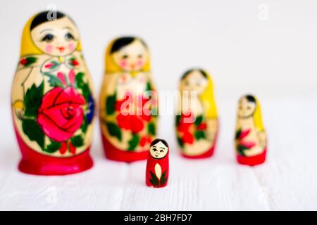 Russian national nesting dolls on a white background. Stock Photo
