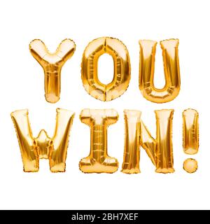 Words YOU WIN made of golden inflatable balloons isolated on white. Helium balloons gold foil letters. Message for winner, champion. Business concept Stock Photo