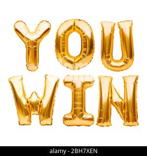 Words YOU WIN made of golden inflatable balloons isolated on white. Helium balloons gold foil letters. Message for winner, champion. Business concept Stock Photo