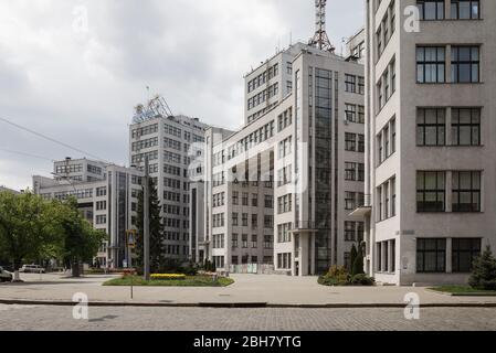 28.04.2019, Kharkiv, , Ukraine - Derschprom on Freedom Square in the centre of Kharkiv, a building of Constructivism, first Soviet high-rise, built be Stock Photo