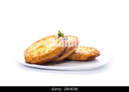 round bread croutons fried in batter in a plate Stock Photo