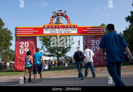 Austin, Texas USA, October 2, 2009: Fans flock through the entrance marquee on the first day of the three-day Austin City Limits Music Festival (ACL) at Zilker Park featuring 130 bands playing to more than 60,000 music fans each day. ©Bob Daemmrich Stock Photo