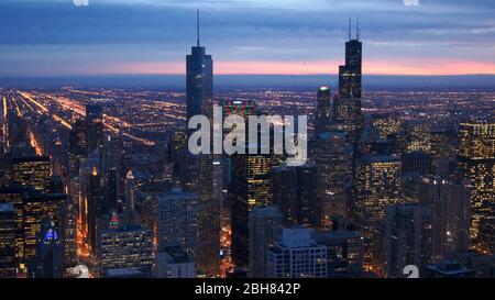 CHICAGO, ILLINOIS, UNITED STATES - DEC 11th, 2015: Aerial view of Chicago downtown at twilight from John Hancock skyscraper high above Stock Photo