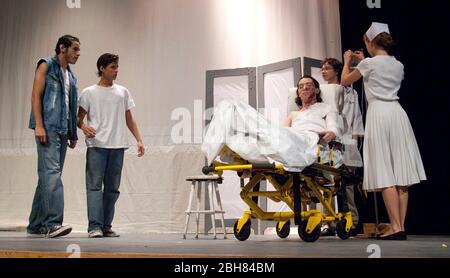 Austin, Texas USA, October 1, 2009: LBJ High School Alley Cat Players production of 'The Outsiders,' an adaptation of the 1967 novel by S.E. Hinton about teens in different socio-economic classes trying to best one another. ©Bob Daemmrich Stock Photo