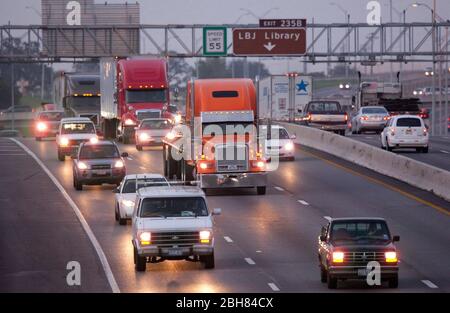 Austin, Texas USA,  October 5, 2009:  Early evening traffic heads into downtown Austin along Interstate 35 at Martin Luther King Blvd. on a slightly foggy evening. © Bob Daemmrich Stock Photo