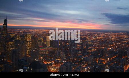 CHICAGO, ILLINOIS, UNITED STATES - DEC 11th, 2015: Aerial view of Chicago downtown at twilight from John Hancock skyscraper high above Stock Photo