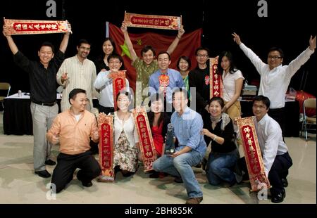 Austin, Texas USA, November 18, 2010. International students who attend the University of Texas at Austin celebrate world diversity at an annual International Night celebration with food, drink and dancing that showcase a dozen cultures in central Texas.  ©Bob Daemmrich Stock Photo