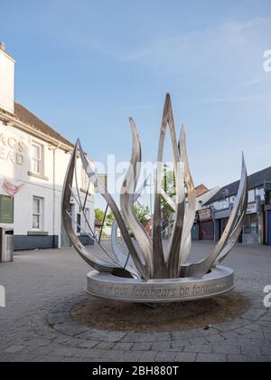 KIRKBY IN ASHFIELD, ENGLAND - APRIL 24: Metal leaf sculpture sited at the Nags Head. Station Street, in Kirkby In Ashfield, Nottinghamshire, England. Stock Photo