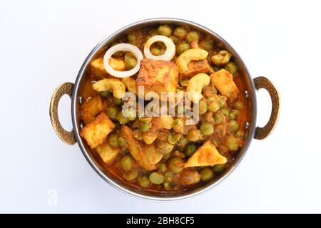 Cottage cheese with Peas in Indian Gravy Stock Photo