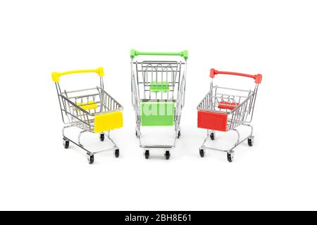 Three miniature shopping carts isolated on white. Stock Photo