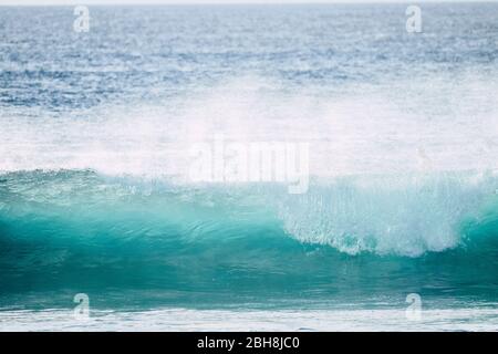 wave power white foam close up with blue clean water and big energy swell for tropical place vacation concept Stock Photo