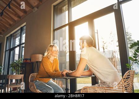 Woman and a man staring at each other Stock Photo