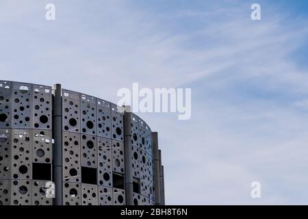 Modern architectural building design against a blue sky background on a bright, sunny day in Glasgow, Scotland Stock Photo