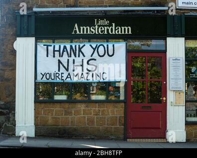 April 24th 2020. Banbury, Oxfordshire, UK. Messages of appreciation, thanks and support towards NHS workers displayed in the window of a business close to the hospital. Thank You NHS Credit: Bridget Catterall Alamy Live News