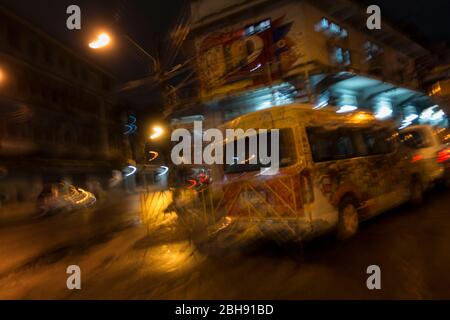 Bus ride at night through Bangkok Stock Photo