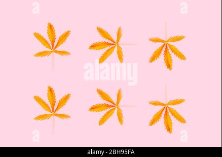 Pattern made from hemp leaf isolated on pink background. Flat lay style. Stock Photo