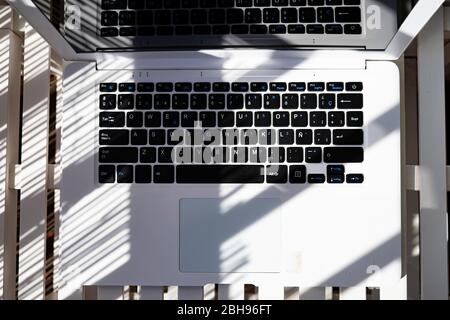 White laptop on a white background. Stock Photo
