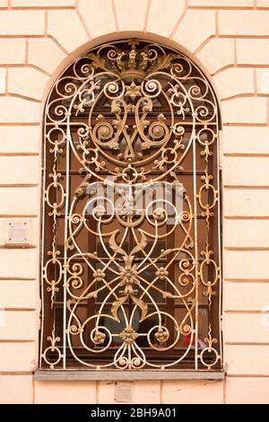 Closeup of window with metallic lattice Stock Photo