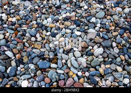 Pebbles on beach, background Stock Photo