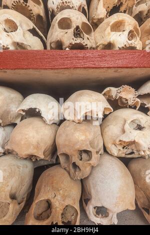 Cambodia, Siem Reap, Wat Thmei, human skulls of Khmer Rougue victims in memorial stupa Stock Photo