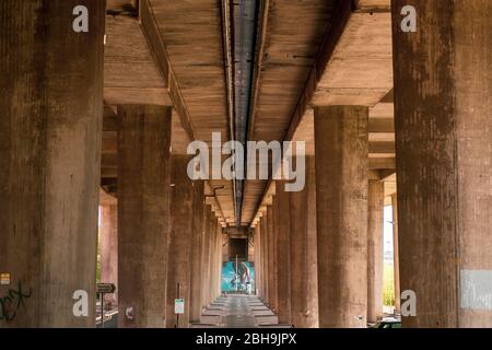 Empty street under the Kingston Bridge in Glasgow as people stay at home during coronavirus lockdown in 2020 Stock Photo