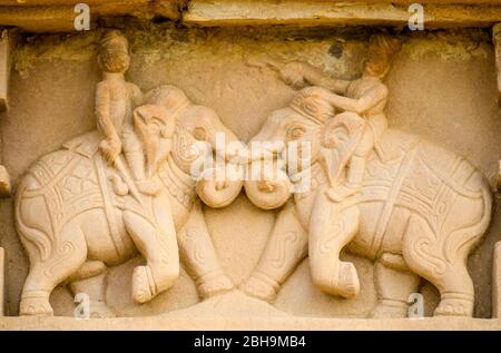 Arts on wall, Khajuraho temples, India Stock Photo