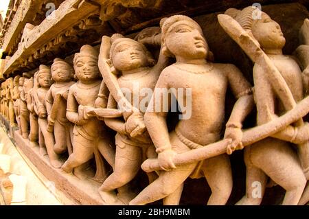 Arts on wall, Khajuraho temples, India Stock Photo