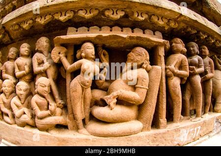 Arts on wall, Khajuraho temples, India Stock Photo