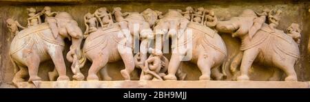 Arts on wall, Khajuraho temples, India Stock Photo