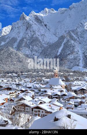 Panoramic view over the village against Karwendel mountains with mount Viererspitze in winter, Mittenwald, Werdenfelser Land, Upper Bavaria, Bavaria, Germany Stock Photo