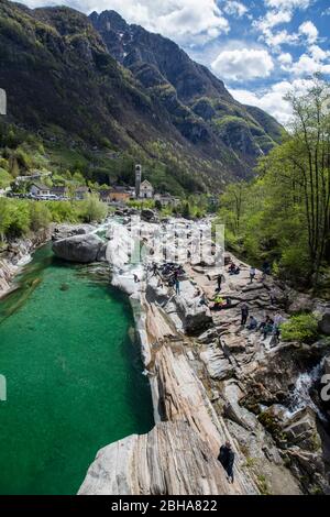 Switzerland, Ticino, Locarno, Verzasca Valley, Lavertezzo, Ponte Dei Salti, green water, smooth rocks, church