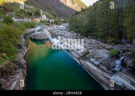 Switzerland, Ticino, Locarno, Verzasca Valley, Lavertezzo, green water, smooth rocks, church