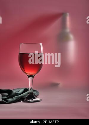 Red wine glass with bottle Stock Photo
