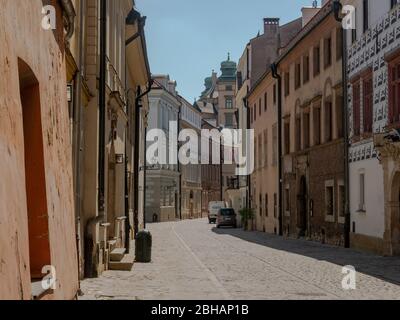 Cracow/Poland - 23/04/2020. Almost empty medieval Kanonicza street in Krakow during coronavirus covid-19 pandemic. Stock Photo