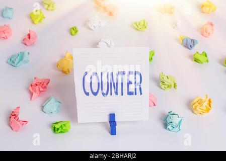 Word writing text Counter. Business photo showcasing a surface used for making transactions in a store or in a bank Colored crumpled papers empty remi Stock Photo
