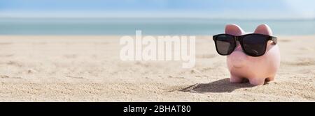 Pink Piggy Bank Object On Vacation At Beach Stock Photo