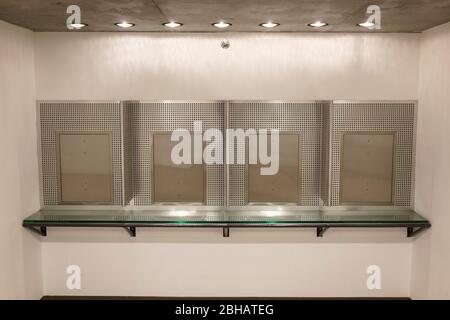 Wall of removed pay phone stations in Los Angles, California. Stock Photo