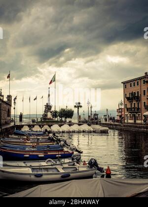 Lake Garda: Port of Lazise with a dramatic sky after a thunderstorm Stock Photo