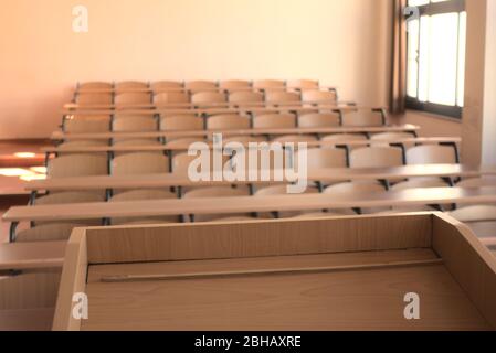 Shot of an empty highschool classroom due to measures taken regarding global pandemic covid 19 Stock Photo