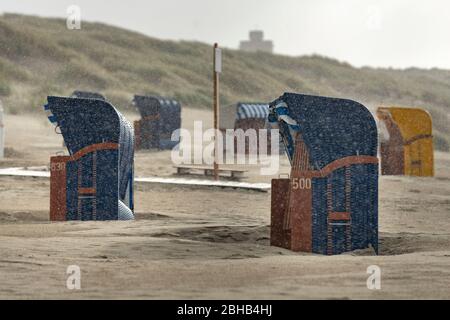 Germany, Lower Saxony, East Frisia, Juist, stormy weather, rain on the beach. Stock Photo