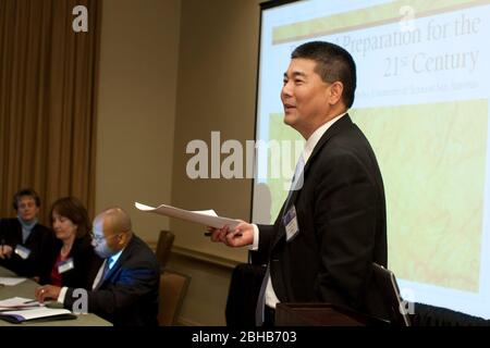 Austin, Texas USA, February 23, 2010: Speaker makes presentation at conference for high school and higher education leaders throughout Texas. Attendees discussed strategies for dealing with budgets, dropout prevention and federal mandates in the challenging economy. ©Bob Daemmrich Stock Photo