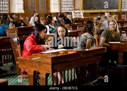 Austin Texas USA, July 20 2010: Hispanic high school students participating in a mock legislative session in the Senate Chamber of the Texas Capitol as part of the Lorenzo de Zavala Youth Legislative Session, a high school age leadership program of the National Hispanic Institute. ©Marjorie Kamys Cotera/Bob Daemmrich Photography Stock Photo
