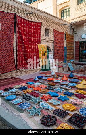 Colorful handcrafted and handpainted pottery sold on a market in Tunisia Stock Photo