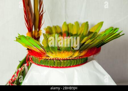 Crown of bird feathers such as parrots and toucans worn by the Shuar elders Stock Photo