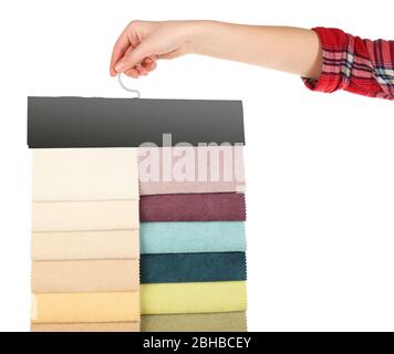 Female hand holding scraps of colored tissue isolated on white Stock Photo