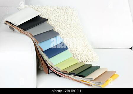 Scraps of colored tissue on sofa close up Stock Photo