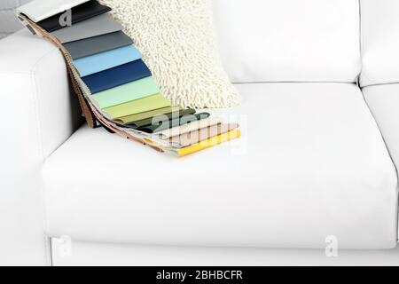 Scraps of colored tissue on sofa close up Stock Photo