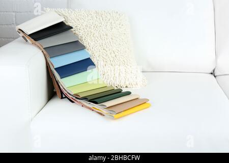 Scraps of colored tissue on sofa close up Stock Photo