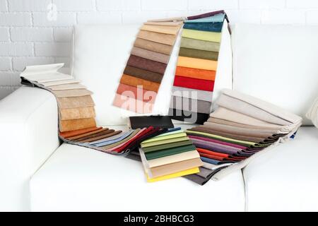 Scraps of colored tissue on sofa close up Stock Photo