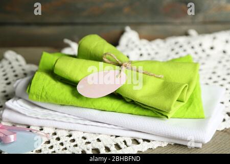 Napkins with Easter decorations  on wooden background Stock Photo